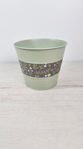 Cubremaceta pastel decorativo para interior, perfecto para vestir plantas de casa.